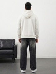 Men's dark black wide leg jeans left side view with premium washed finish.
