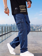 Front view of men's navy blue relaxed fit cargo jeans with utility pockets